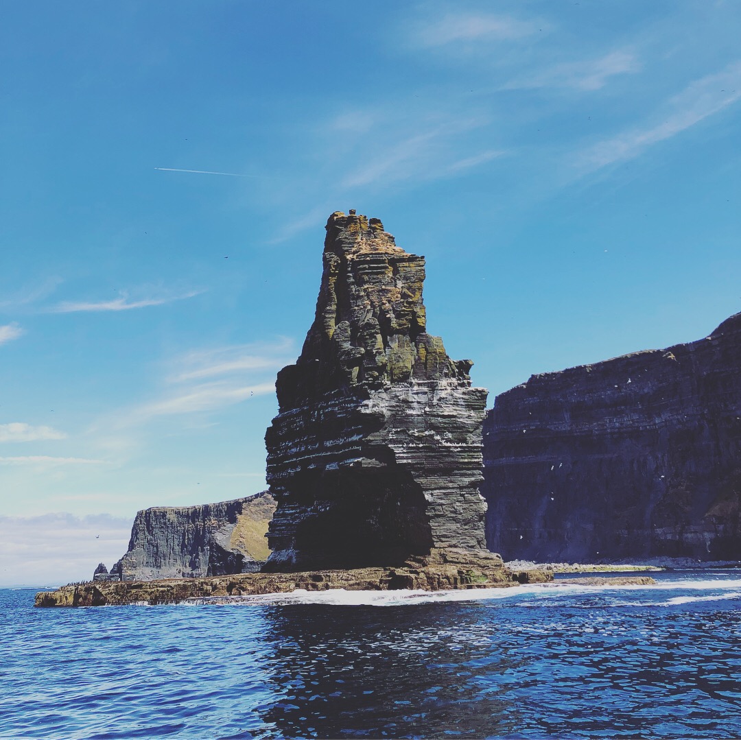 tall rocks protruding from the water's surface