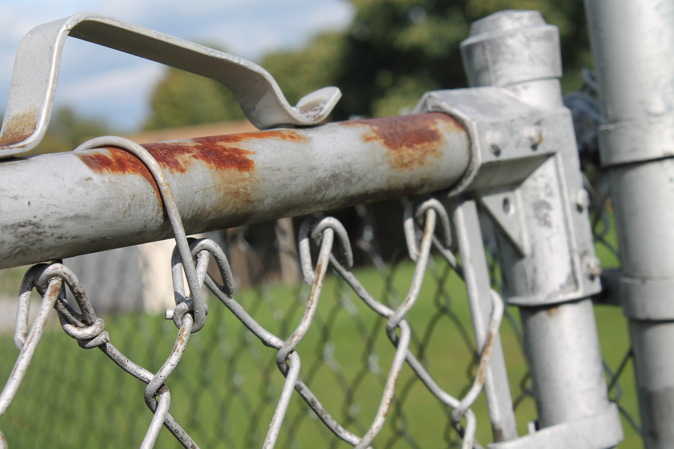 a rusty aluminium fence