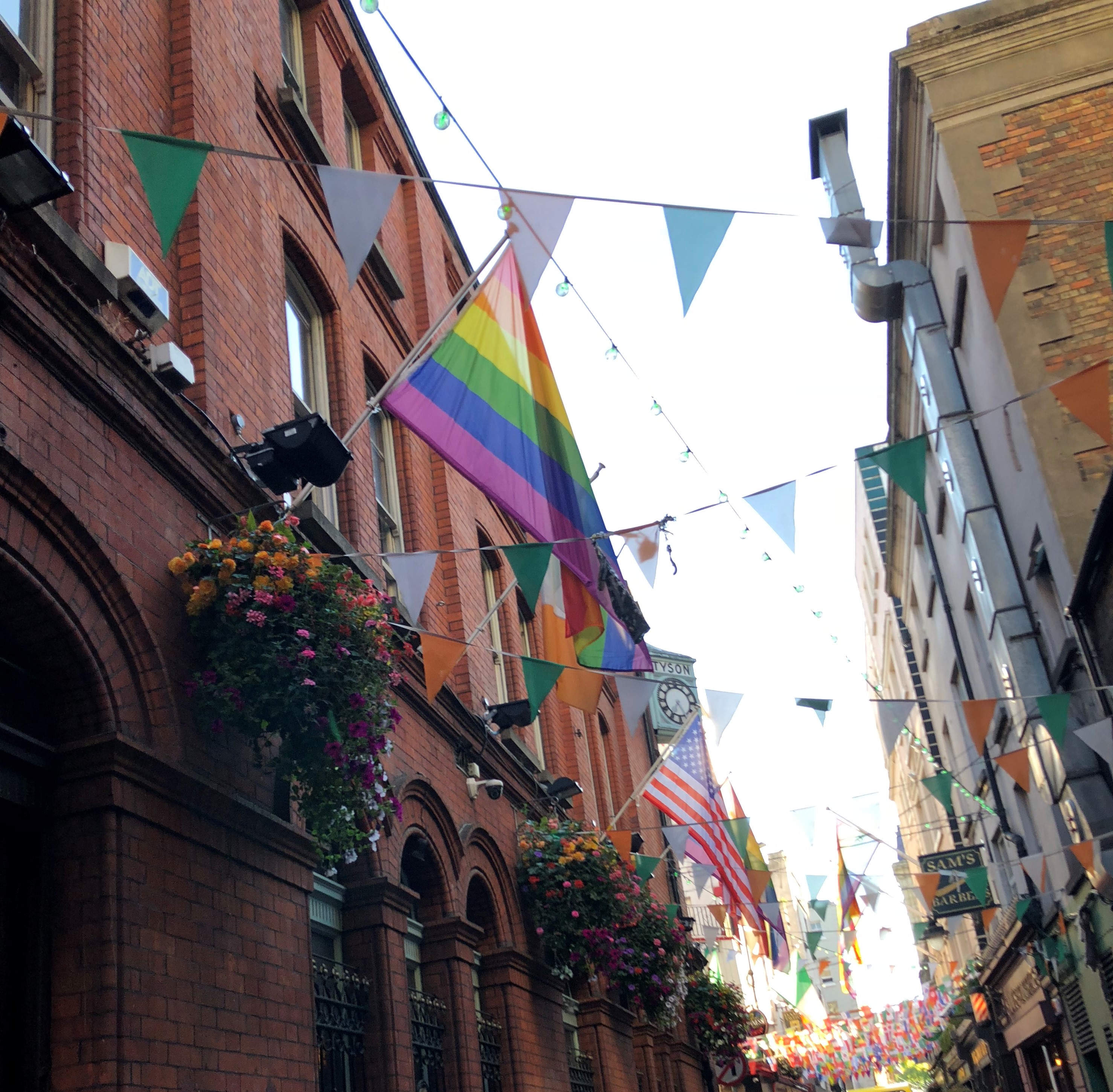 flags strung up in an allyway, Dublin, Ireland, Jul 2018